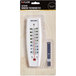 A white Taylor outdoor window thermometer in a package.