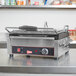 A Cecilware single panini grill with grooved surfaces on a counter.