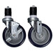 A pair of Advance Tabco heavy duty casters with rubber wheels.