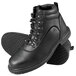 A pair of Genuine Grip black steel toe leather boots with a zipper lock.