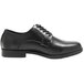 A black Genuine Grip men's oxford dress shoe with laces and a rubber sole.