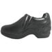 A black full grain leather clog with a black sole and side zipper.
