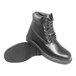 A close-up of a Genuine Grip black leather boot with a black rubber sole.