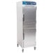 A large silver Alto-Shaam Dutch door holding cabinet with wheels.