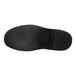 A Genuine Grip men's black work shoe with a black rubber sole with a square pattern.