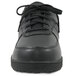 A close-up of a black Genuine Grip men's sport classic shoe with laces.