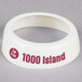 A white plastic Tablecraft salad dressing dispenser collar with maroon text reading "Fat Free 1000 Island"