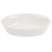 A white oval baker dish on a white background.