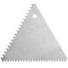 An aluminum triangular decorating and icing comb with a hole on a white background.