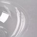 A clear plastic Fineline Super Bowl with a lid on it.