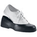 A pair of black overshoes with a black sole.