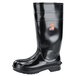 A black waterproof rubber work boot with a rubber sole.