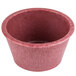 A red polyethylene ramekin with a white background.