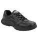 A black Reebok athletic shoe with white text on the side.