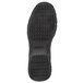 The sole of a Reebok black athletic shoe with rubber treads.