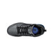 A black Shoes For Crews Tigon athletic shoe with a blue sole.