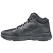 A black Shoes For Crews Hart men's athletic shoe with laces.
