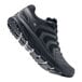 A black Shoes For Crews athletic shoe.