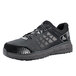 A black and grey ACE Aster women's athletic shoe.