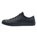 A black leather Shoes For Crews men's casual shoe with laces and a rubber sole.