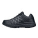 A close-up of a black ACE Trident III men's athletic shoe with a mesh upper.