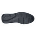 A black Shoes For Crews Holden shoe sole with rubber tread.