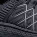 A close up of a black ACE Trident III men's athletic shoe.