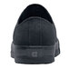 A black Shoes For Crews Delray shoe with a rubber sole.