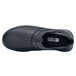 A black Shoes For Crews Alia women's non-slip shoe with a white sole.