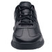 Shoes For Crews Freestyle II unisex wide width black athletic shoe with red accents.