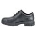 A black leather Shoes For Crews work boot for men with laces.