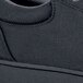 a close up of a black shoe