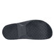 The black sole of a pair of Shoes For Crews Radium shoes.