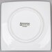 A white square porcelain plate with the word "Arcoroc" in black text.