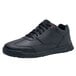 A black Women's Shoes For Crews athletic shoe with red laces.