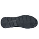 The black sole of a Shoes For Crews Stride men's athletic shoe.