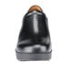 A close-up of a black leather Shoes For Crews Juno shoe with a rubber sole.