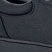 A close up side view of a black MOZO Maven shoe with a rubber sole.