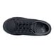 A close-up of a black MOZO women's shoe with laces.