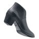 A black Shoes For Crews Delilah women's dress shoe with a non-slip sole.