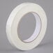 A roll of white Shurtape fiberglass reinforced strapping tape.