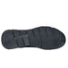 The black rubber sole of a Shoes For Crews Stride men's athletic shoe.