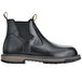 A black work boot with a yellow sole.