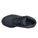 A close-up of a black MOZO men's shoe with laces on a white background.