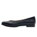 A black leather flat dress shoe with a black sole.
