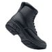 A close up of a black Shoes For Crews August work boot with laces and rubber soles.