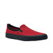 A red and black slip on shoe with a white background.
