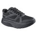 A black Shoes For Crews women's athletic shoe with a white background.