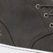 A gray leather MOZO Finn Chukka men's casual shoe with a white sole.