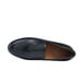 A pair of black leather Shoes For Crews women's dress shoes with a brown rubber sole.